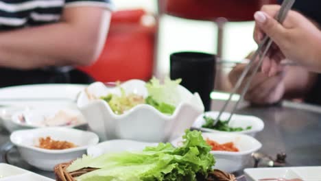 group enjoying a korean bbq meal