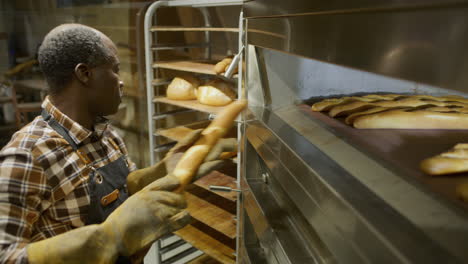 baker working in a commercial bakery