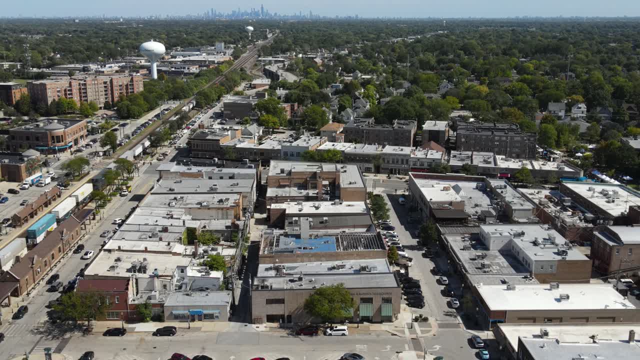 Aerial View of a Suburban Downtown Area with Chicago Skyline in the Background