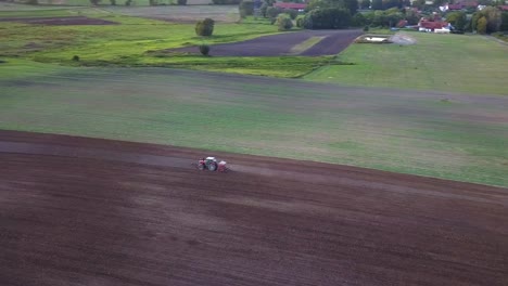 tractor plowing aerial shot
