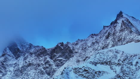 Sunrise-sunset-morning-blue-hour-Saas-Fee-Saastal-Zermatt-Switzerland-aerial-drone-gondola-Metro-Alpin-tram-Swiss-Alpine-Alps-chalet-valley-mountains-glacier-Feevispa-upwards