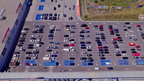 drone flies over a large used car parking lot