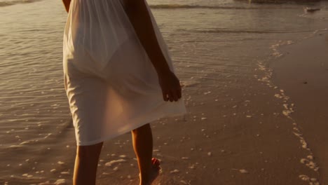 young woman by the sea