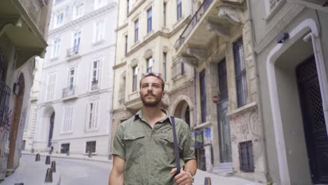 man walking in the back streets of the city.