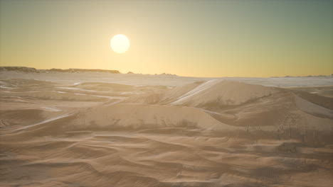 red sand desert dunes at sunset