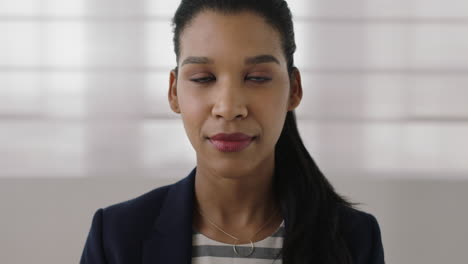 portrait of young independent mixed race business woman smiling confident looking at camera ambitious female executive close up