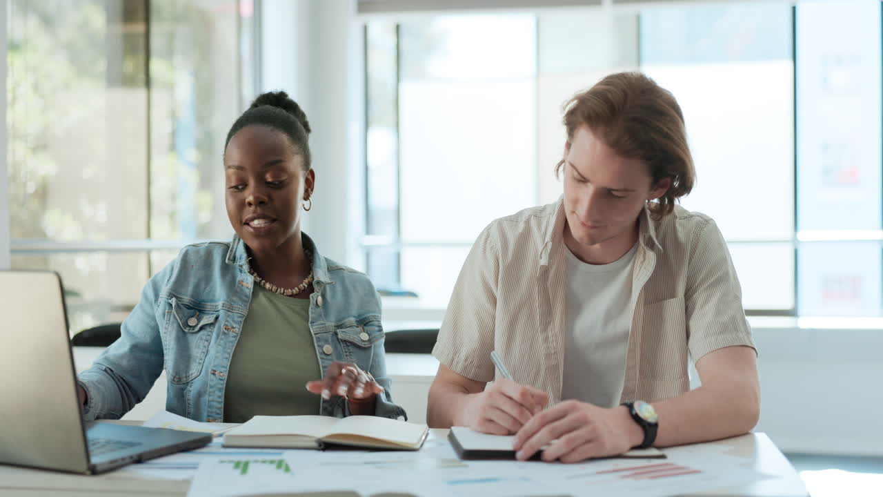 Business colleagues collaborating on project