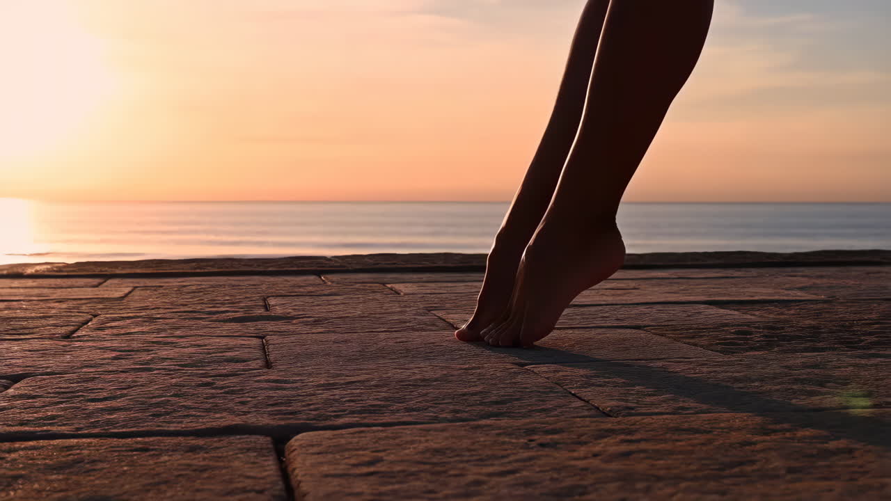 Silhouetted Legs and Feet on a Pier at Sunset