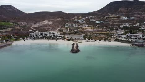 playa caimancito and la concha in la paz, baja california, with serene turquoise waters and coastal resorts, aerial view