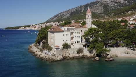 coastal town with church and hotel in croatia