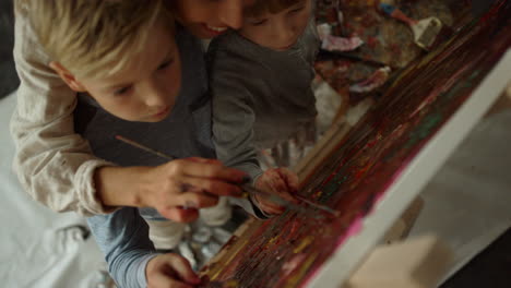 children creating artwork in school