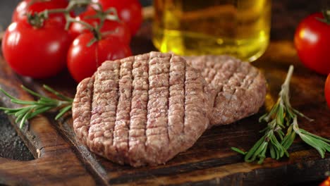 the fried burger meat on the cutting board rotates.