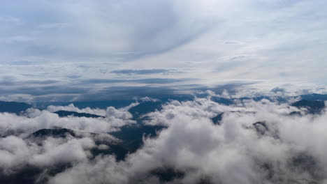 time lapse flying above clouds on rainy season, moving cloud hyperlapse