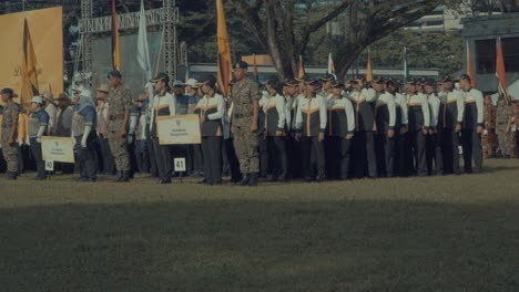 military personnel in formation at a public ceremony
