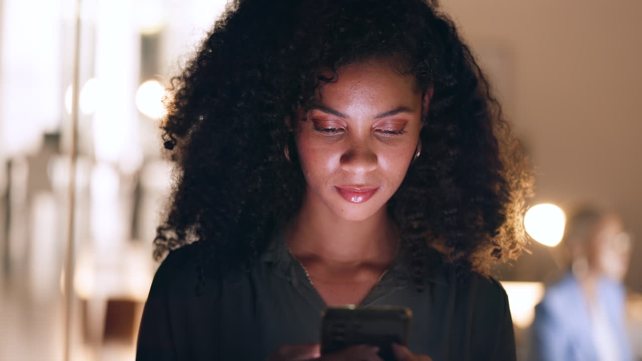 Social media, phone and black woman in a dark