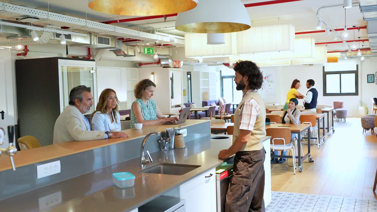 People working and meeting in a modern coworking space