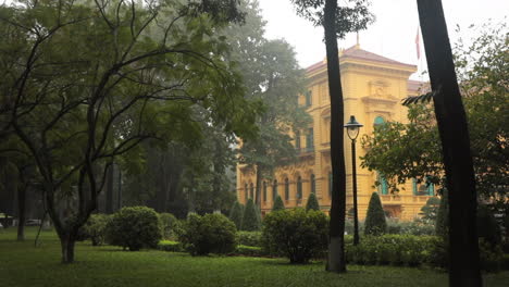presidential palace in hanoi, vietnam on a foggy day