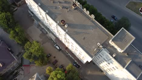 Aerial-view-shot-of-Chisinau-in-Moldova-with-roads,-buildings,-cars-and-trees-in-daylight