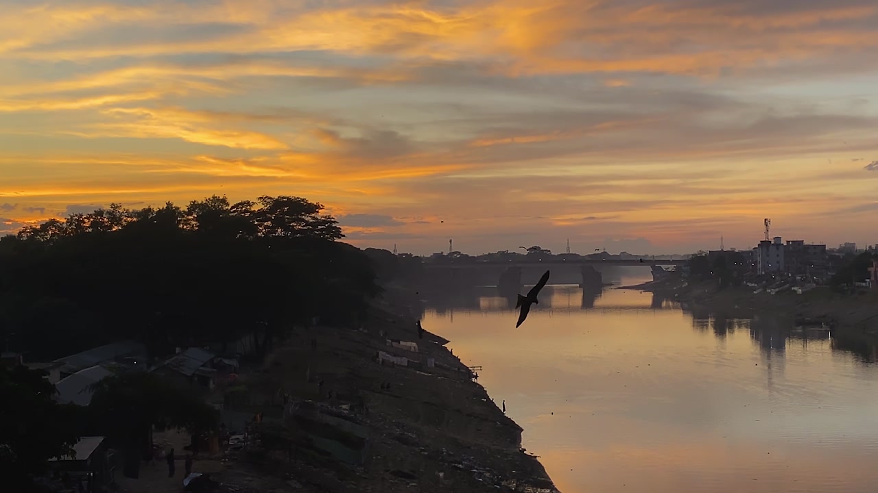 Scenic Sunset Light Over Surma River With Flying Eagles In Sylhet, Bangladesh. Aerial Shot