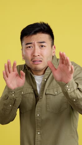 man expressing fear and disgust