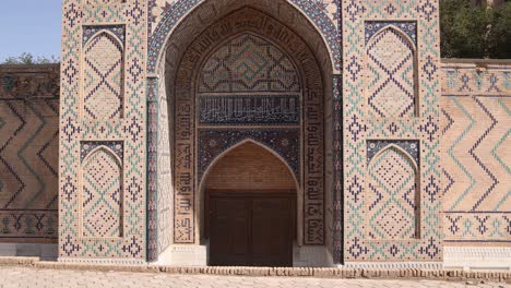 dramatic shadowing on the front of archway in registan in samarkand, uzbekistan along the historic silk road