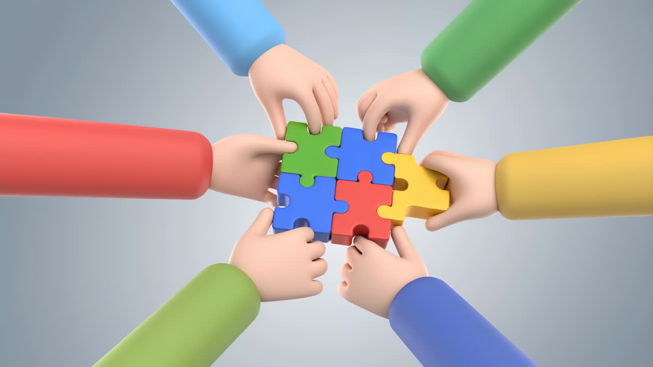 Teamwork and collaboration concept with hands assembling colorful puzzle pieces