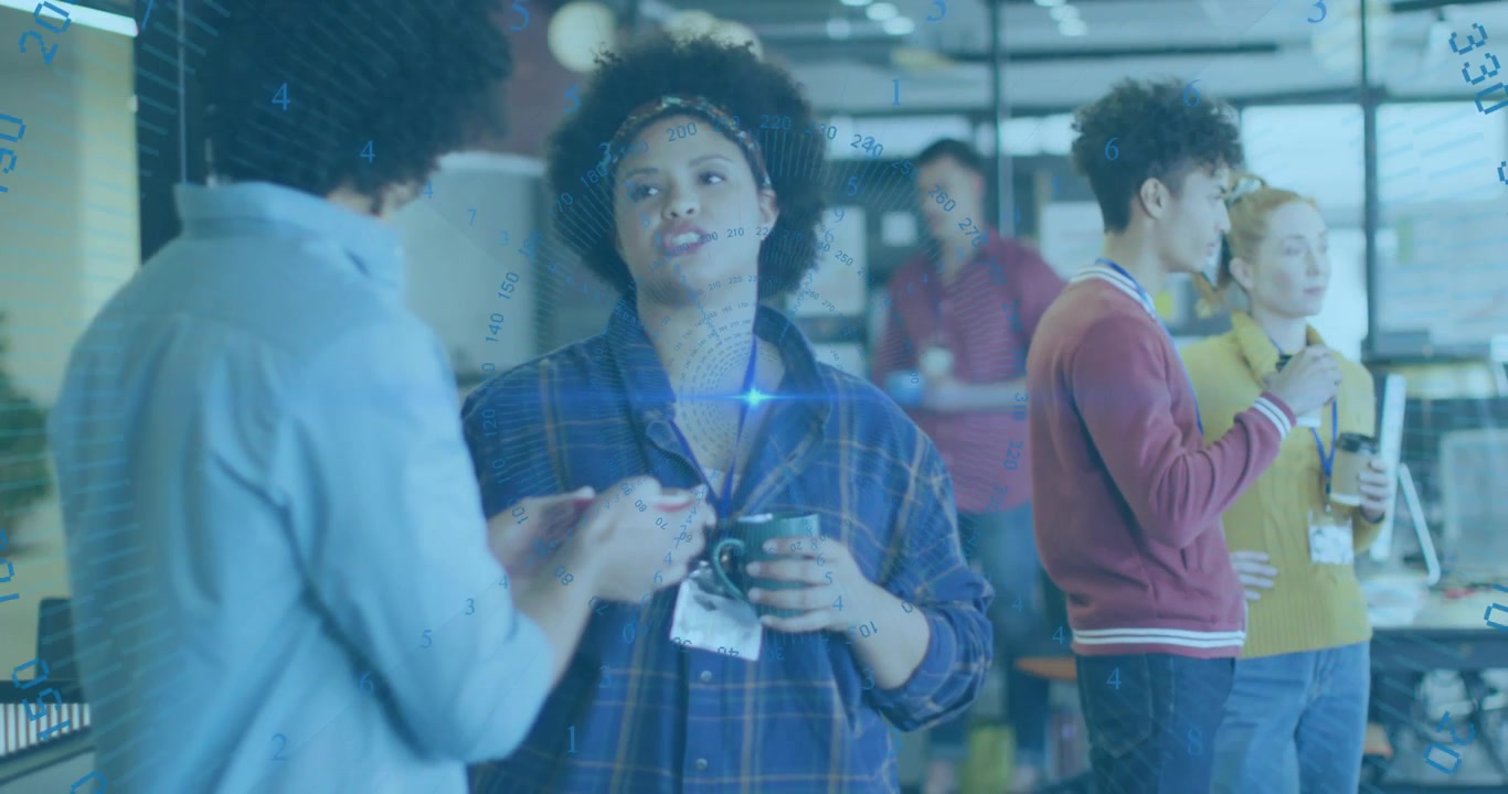 Female coworker tapping smartphone and showing chart as coworker sipping coffee in business office