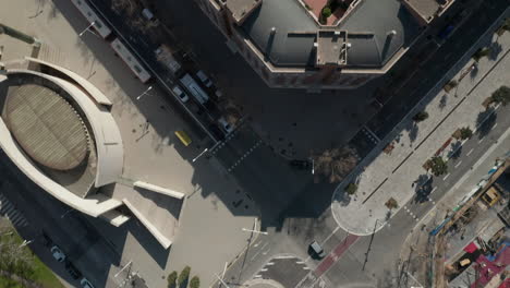 Fly-above-road-intersection-and-residential-complex-in-urban-borough.-Modern-living-in-city.-Barcelona,-Spain