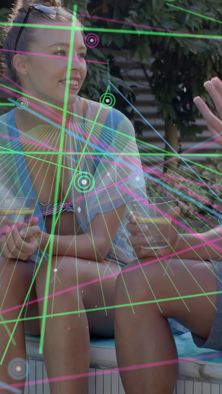 Vertical video: Camera pulling back, couple at pool, woman gesturing, neon AR lines showing tech