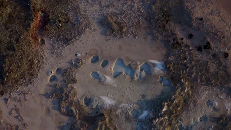 mud pots on the geothermal field in reykjanes peninsula in iceland