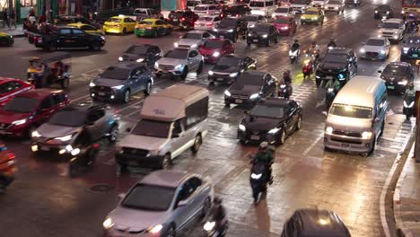 time-lapse of busy intersection with colorful vehicles