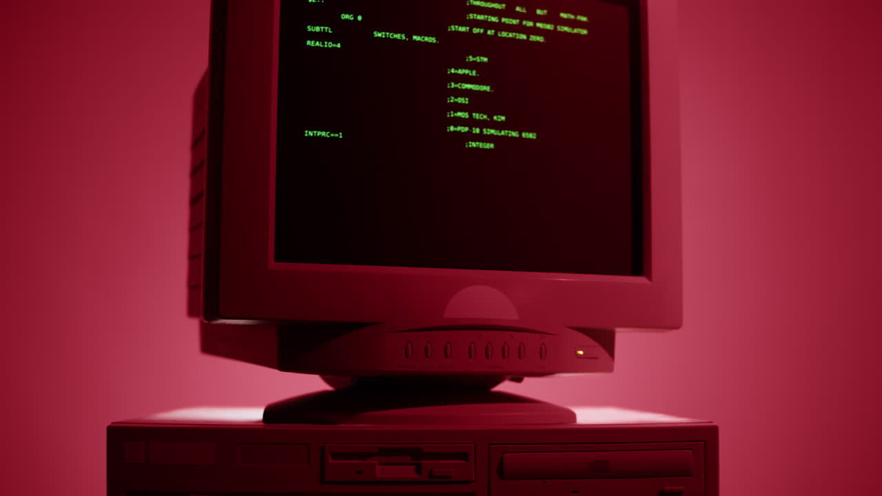 Vintage Computer with Green Text on CRT Monitor