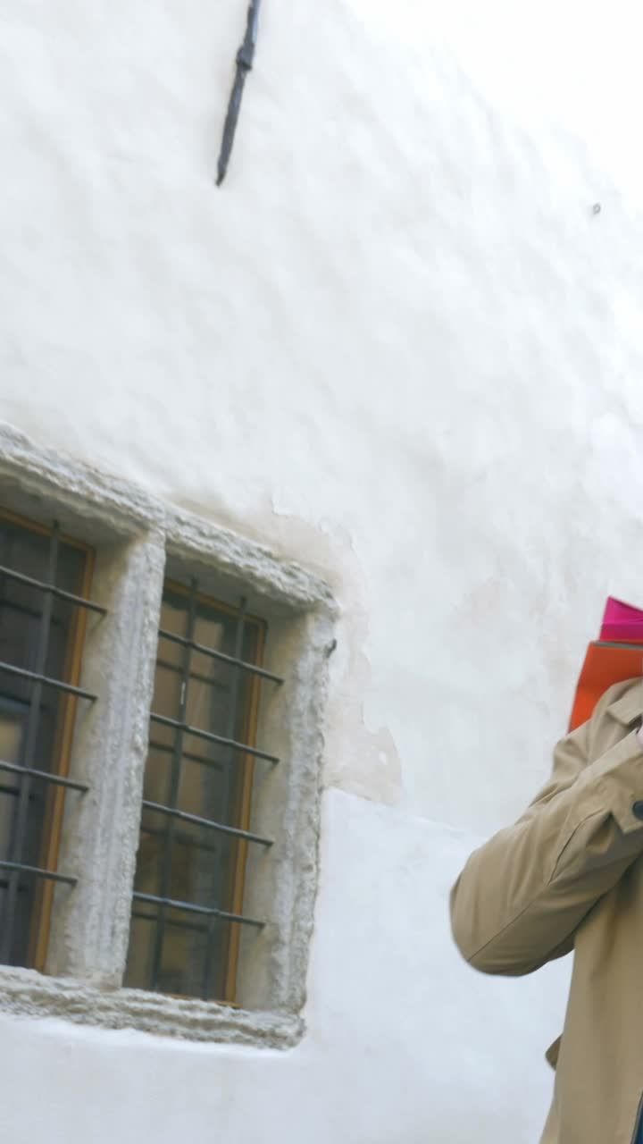 Man with Shopping Bags in City