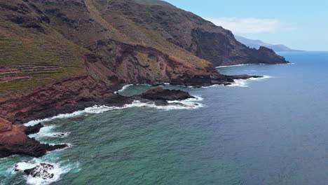 majestic cliffs and ocean view in garachico, tenerife under a clear sky
