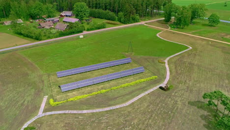 aerial view of solar panels array in green