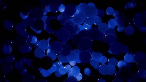 Abstract 4k background of spheres in shades of blue. Balls like leds hang in air and light up and go out. Bright stylish background