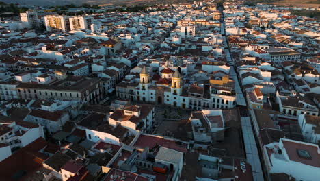 white-washed buildings in the town of ronda in spain - aerial drone shot