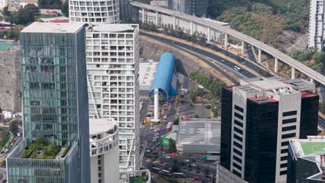 Overhead footage of Santa Fe's main avenue, with towering buildings in CDMX