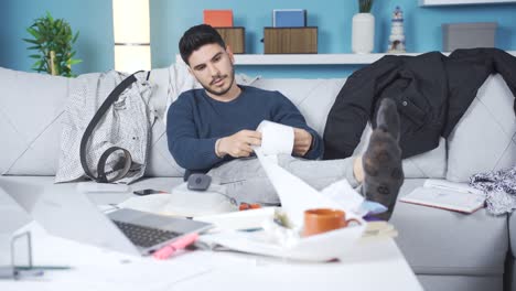 Lazy-young-man-in-messy-and-dirty-house.