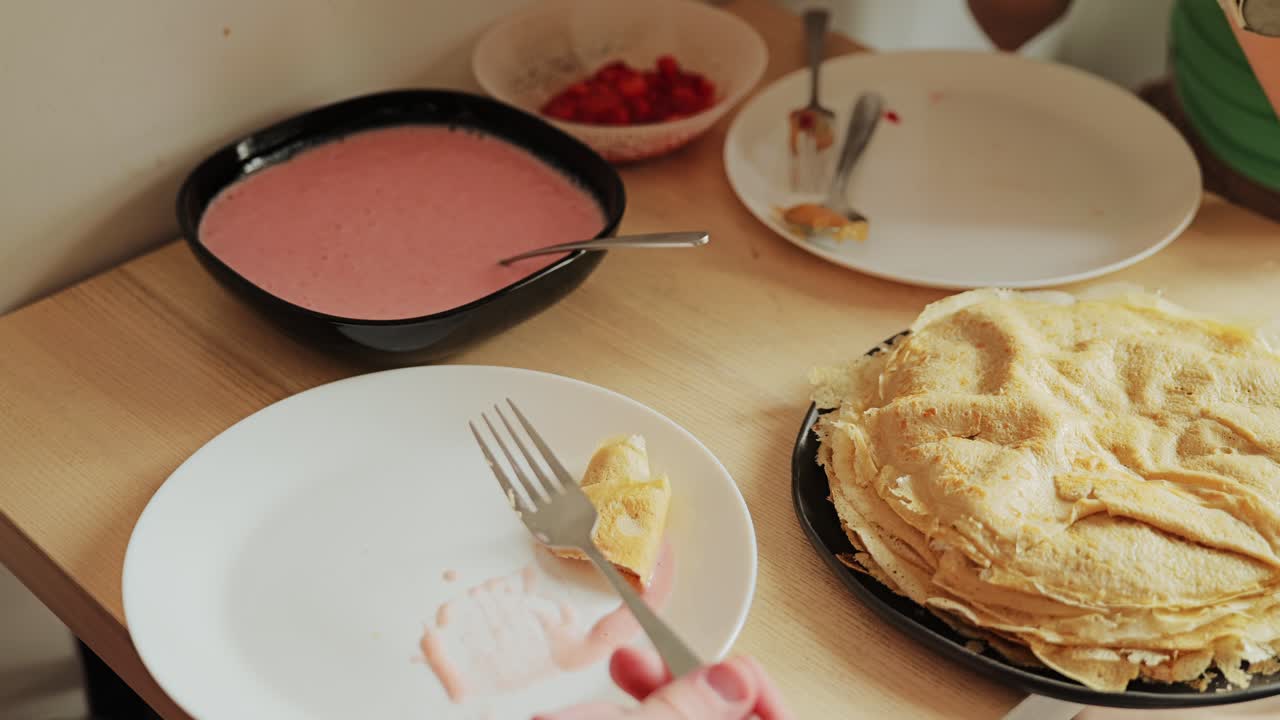 Cozy homemade pancakes with strawberry cream symbolize warmth and affection