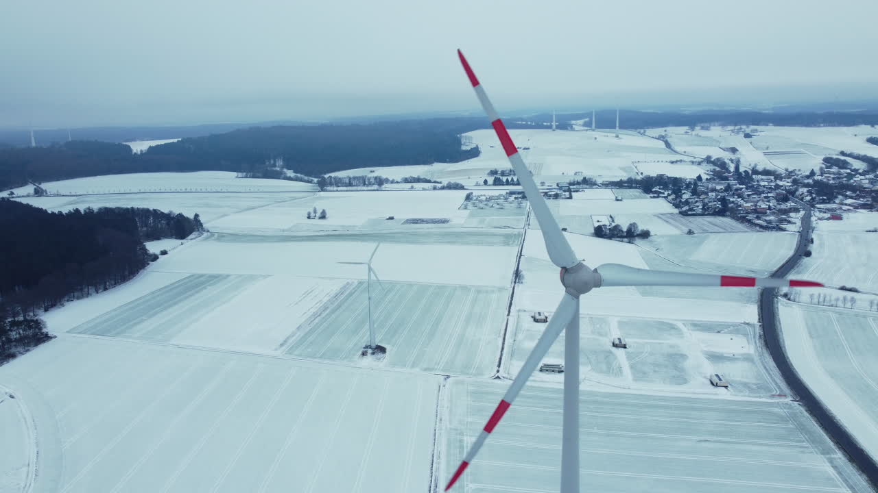 Snowy Landscape with Wind Turbines