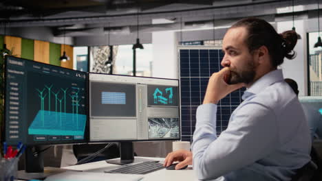 renewable energy researcher using simulation software, improving green industry