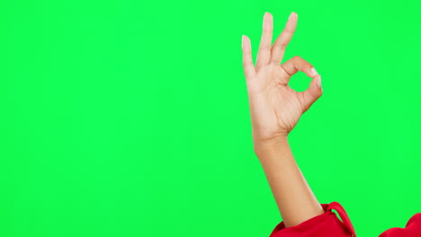 Ok-sign,-good-and-hand-of-a-person-on-green-screen