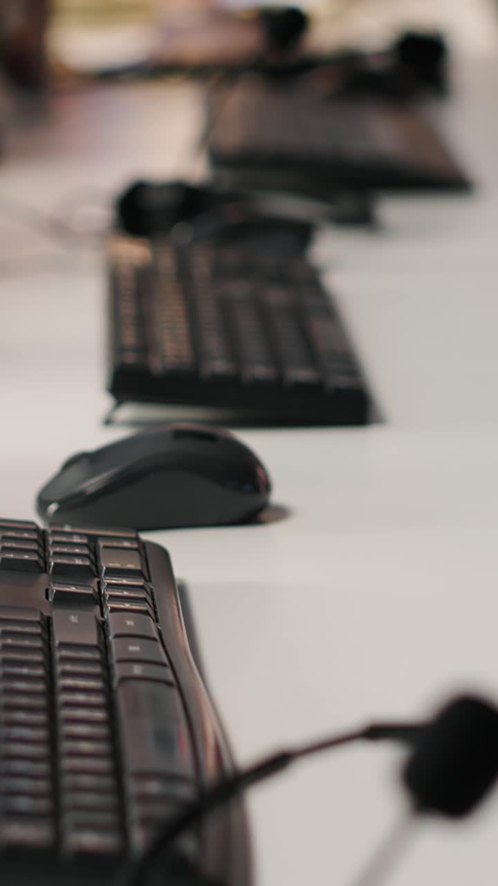 Vertical video CSM interface on computer monitors and audio headsets in empty call center