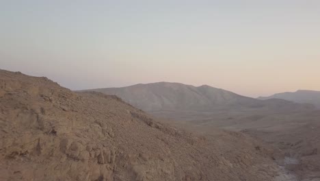 Birds-eye-view-of-a-ravine-going-to-a-valley-view-in-Mount-Sodom-circa-March-2019