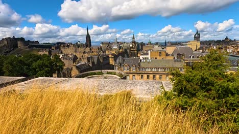 panoramic view of edinburgh from grassy hill