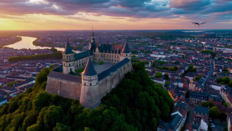aerial view of a castle at sunset