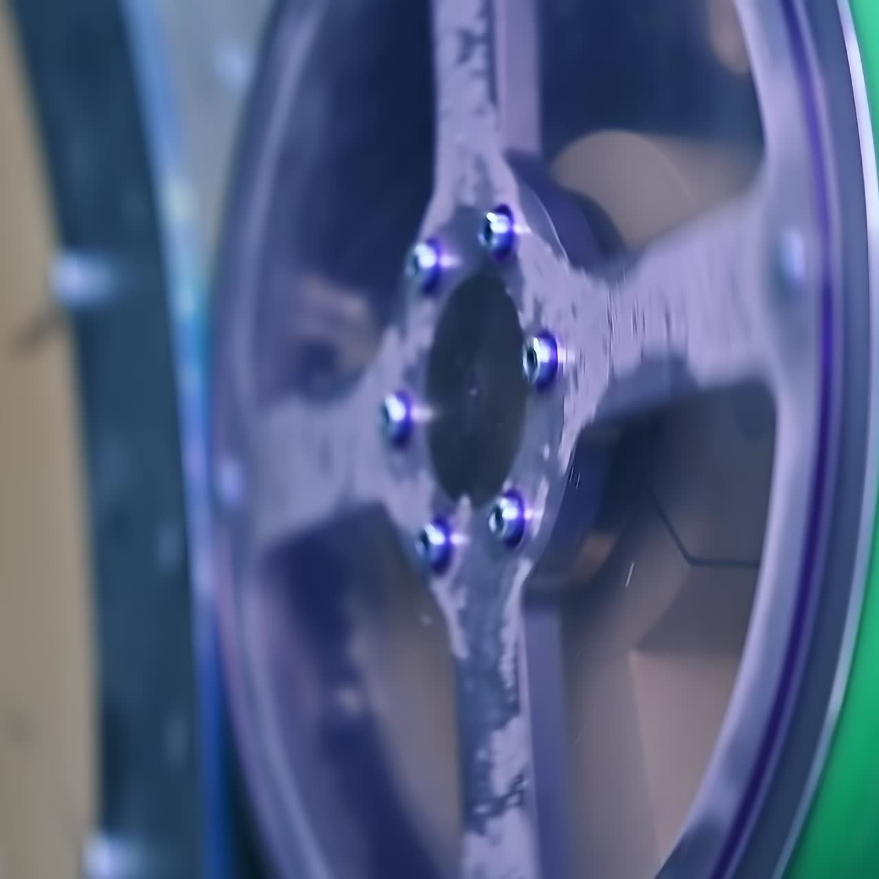 Two big reels rotating in diaper manufacturing company. Reels turning side by side. Close up