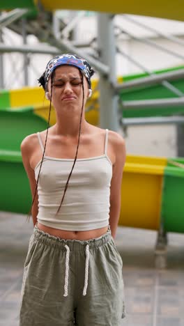 displeased teenager at water park