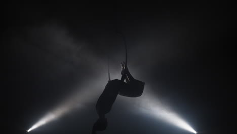 aerial hoop performance in the dark